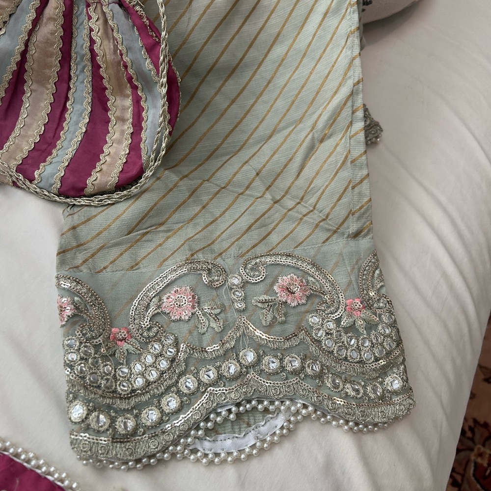 Elegant Embroidered Fabric with Beaded Details